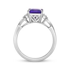 Clear and bright, this gemstone ring brings beauty to your wardrobe. Crafted in sterling silver A rectangle-cut amethyst is the rich focal point White lab-created sapphires decorate the leaf designs that flank the center stone A polished, twisted split shank lends interest to the style Formal Purple Rings With Rectangular Stone, Classic Amethyst Rectangular Ring For Anniversary, Classic Rectangular Amethyst Ring For Anniversary, Purple Rectangular Stone Ring For Anniversary, Purple Gemstone Ring With Rectangular Stone, Purple Rings With Rectangular Stone For Anniversary, Square Cut Amethyst Ring For Formal Occasions, Elegant Rectangular Amethyst Ring, Formal Square Cut Amethyst Ring