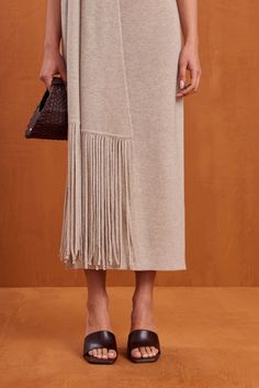 A knit midi dress with a removable fringe scarf neck strap that can be worn as a halter style two different ways. — Midi length — Knit fabric — Removable fringed scarf neck tie — Open back Scarf Neck Tie, Evening Flats, Scarf Neck, Sandal Platform, Fringe Scarf, Millet, Knit Midi, Knit Midi Dress, Halter Style