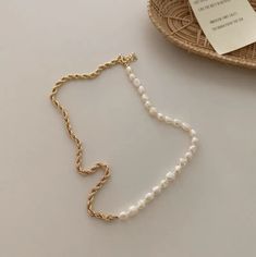 Baroque style necklace, half gold half pearl Pearl White Pearl Necklace With Chain, Pearl White Pearl Clavicle Chain Necklace, Pearl Choker Necklace With Chain, Pearl Choker Necklace With Chain Detail, Gold Pearl Clavicle Chain Choker, Gold Pearl Choker With Clavicle Chain, Gold Pearl Pendant Choker Necklace, Gold Pearl Choker Chain Necklace, Gold Choker Chain Necklace With Pearl Pendant