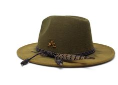 "The Gustavo Hat- Tulum Collection Fedora Hat One Size Design- With a tie of a knot, adjust the fit of your hat to the ideal size. 21 ¼ to 23 ¼ inches. Color: Sun Bleached Olive Green Bolo Braided Cord Natural Ringneck Pheasant Feather Hand Stitched Agave Motif Material: 65% Cotton , 35% Polyester Dimensions: Brim: 2 7/8\", Crown: 4\" We take pride in hand crafted goods & natures unique imperfections. No two hats are the same." Adjustable Green Hat Band For Fall, Adjustable Fedora Hat Bands For Hunting, Casual Adjustable Hat Bands For Hunting, Casual Fedora Hunting Hat, Casual Fedora Hat For Hunting, Adjustable Fedora Hunting Hat, Adjustable Fedora Felt Hat For Hunting, Adjustable Fedora Hat For Hunting, Adjustable Flat Brim Felt Hunting Hat