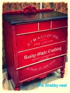 a red chest with writing on it and the words straubburg fine custom