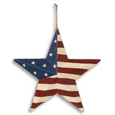 an american flag star ornament hanging from a string