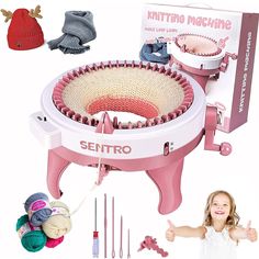 the knitting machine is pink and white with red trimmings next to it's contents