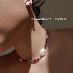 Discover timeless elegance with our Adjustable Baroque Pearl Necklace - an exquisite blend of sophistication and modern charm.  This stunning choker showcases lustrous Baroque pearls harmoniously paired with radiant purple round and square gemstones, creating a striking visual feast. Enhanced with delicate pink gold accents, this necklace exudes a unique elegance that's perfect for any occasion. Whether you're looking to elevate your own jewelry collection or searching for the ideal gift for her Multicolor Pearl Jewelry With Faceted Beads, Elegant Pearl Crystal Necklace With Colorful Beads, Elegant Choker With Natural Stones And Round Beads, Elegant Choker With Round Natural Stones, Elegant Gemstone Beaded Choker Necklaces, Elegant Gemstone Crystal Choker Necklace, Elegant Gemstone Crystal Choker, Elegant Crystal Gemstone Bead Choker Necklace, Elegant Crystal Gemstone Beads Choker