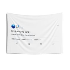 a white wall hanging with a tweet on it that says i'm nice at ping pong