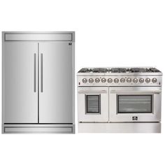 two ovens and a refrigerator are shown in this image, one is stainless steel