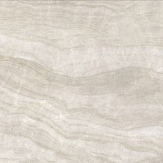 a white marble textured surface with light brown streaks