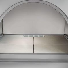 a stainless steel stove top oven sitting inside of a kitchen