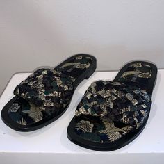 In Great Condition No Signs Of Visible Wear. No Box Or Dust Bag Casual Black Woven Sandals, Black Closed Toe Sandals With Woven Sole, Black Slides With Woven Sole For Summer, Black Slides With Woven Sole And Round Toe, Spring Black Slides With Woven Sole, Black Sandals With Woven Sole For Beach, Black Open Toe Slides For Party, Chic Black Sandals With Woven Sole, Beach Black Sandals With Woven Detail