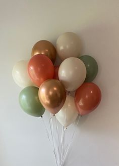 a bunch of balloons that are on the wall