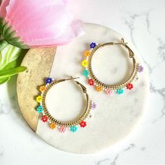 Seed Bead Daisy Flower Hoop Earrings Gold Bohemian Hippie Boho Jewelry Gift New Brand New See Pictures For Measurements! Zinc Alloy Material Even Prettier In Person, Perfect For Casual Or Special / Formal Occasions I Love To Bundle! Contact Me For Bundle Pricing Before Purchase! Inventory Bin H Rhinestone Bling Boho Cute Nature Stud Small Dainty Formal Wedding Birthday Party Gift Festival Spring Summer 2022 2023 Trends Trendy Casual Cute Statement Earrings Fashion Accessories New Fashion Cocktai Multicolor Flower Shaped Jewelry For Summer, Multicolor Flower-shaped Jewelry For Summer, Spring Bohemian Jewelry With Colorful Beads, Bohemian Spring Jewelry With Colorful Beads, Bohemian Dangle Hoop Earrings For Spring, Multicolor Bohemian Hoop Earrings For Spring, Spring Jewelry With Colorful Beads In Gold, Multicolor Summer Flower Charm Earrings, Summer Multicolor Flower Charm Earrings