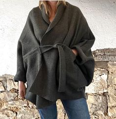 Warm and Oversized Coat Cardigan with Big Loose Sleeves to accommodate many layers! This is my `Go To` coat come cardi.  Throw it on for insta style wherever you want to go.  Wrap tie front and ample oversized styling. Long raglan sleeve with turn-up cuff.    Drapes beautifully and is so cosy!! . A wardrobe staple.  This is a more fluid style as opposed to the square cut minimal coatigan seen here: https://www.etsy.com/listing/701995636/boiled-wool-beige-overcoat-with-wide?ref=shop_home_active_2 Oversized Shawl Collar Outerwear For Winter, Oversized Wrap Outerwear For Fall, Oversized Wrap Outerwear For Winter, Oversized Casual Wrap Outerwear, Casual Oversized Wrap Outerwear, Oversized Lagenlook Cardigan For Winter, Casual Wrap Winter Outerwear, Oversize Cardigan, Cape Style