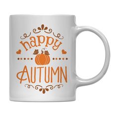 a white coffee mug with the words happy autumn on it