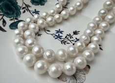 Material  : Genuine Freshwater Pearl Length   : 17.5 / 20 inches ready to wear necklaces Shape      :  Potato  Bead Size:  13-15 mm approx.  Clasp Size : 10 mm Silver Color       :   Natural White Shipping :  We ship all orders within 24 hours from the U.S. (We closed on Saturday and Sunday)                            ** We Offer CUSTOM MADE SERVICES and WHOLESALE DISCOUNTS on LARGE QUANTITY PURCHASE.  Please convo us on your requirements.  We will be happy to create a private listing for you** White High Luster Round Bead Necklaces, White High Luster Round Beads Necklace, White High Luster Round Beaded Necklaces, Formal White High Luster Necklace, White High Luster Necklace For Anniversary, Luxury White Necklaces For Jewelry Making, Formal White Round Bead Necklaces, Bridal Pearl Necklace, Wear Necklaces