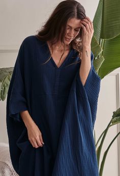 Eco friendly caftans and tunics inspired by the ocean, made on main street. Ethically sourced and locally made in Los Angeles. Unleash your inner Goddess in our ultra-roomy, ultra-comfy Gauze Talitha caftan. With the popularity of our silk Talitha - our roomiest, most luxuriously cut, most comfortable caftan - we had to offer it in our cotton, the perfect, everyday, year-round, go-to fabric. With yards of flowing fabric, it doesn't get more comfortable or chic than this. A flattering deep v-neck Luxury Linen Kaftan For Spring, Luxury Elegant Cotton Silk Kaftan, Luxury Bohemian Kaftan With Relaxed Fit, Luxury Chic Kaftan For Loungewear, Blue Summer Kaftan, Luxury Oversized Kaftan For Beach, Luxury Flowy Tunic, Luxury Long Sleeve Kaftan For Vacation, Luxury Casual Summer Kaftan