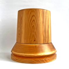 a wooden top hat on a white background