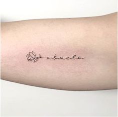 a woman's arm with the word danielle written in cursive writing on it