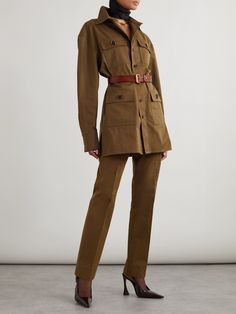 Classic military uniforms and early archival designs from the '60s inspire SAINT LAURENT's shirt. Worn on the Spring '24 runway in Paris, it's been made in Italy from cotton-twill and is classically tailored with a pointed collar, dropped shoulders and utilitarian patch pockets. The detachable leather belt doubles your styling options. Saint Laurent Shirt, Pleated Shirt, Military Uniforms, Sports Skirts, Twill Shirt, Short En Jean, Charlotte Tilbury, Clothes Collection, Military Fashion