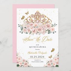 save the date card with pink roses and gold foil on it, in front of a marble