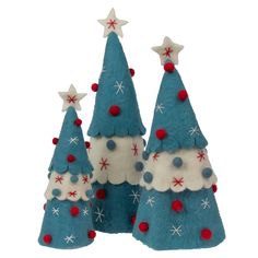 three felt christmas trees with red and white stars on them, one is blue and the other is white