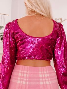 The Eliana Top from Sassy Shortcake is a long sleeve magenta sequin top. She features an open scoop back. She is also lined, making sure the sequins cause no itch! Great quality! fit: true to size (model wearing size small) Stretch Long Sleeve Sequin Blouse, Stretch Long Sleeve Blouse With Sequins, Glamorous Pink Blouse For Night Out, Pink Sequined Tops For Fall, Glamorous Long Sleeve Sequin Blouse, Pink Blouse For Night Out Party Season, Stretch Sequin Blouse For Party Season, Festive Long Sleeve Blouse With Sequins, Pink Holiday Party Tops