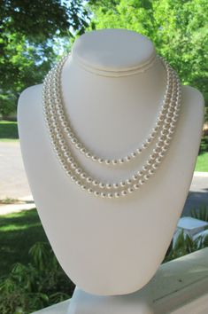 "Chunky Pearl Necklace ~ This elegant staggered three strand pearl necklace makes the perfect bridal jewelry, gifts for bridesmaids, or mother of the bride jewelry! It is lovely accent for your everyday wardrobe as well; so Jackie O! Made with a smaller 6mm Swarovski pearl, it adds such class to any day; whether you are a bride walking down the aisle in her bridal jewelry, or a woman getting ready for a day at the office. This staggered length necklace measures 16\" along the shortest strand wit Double Strand Pearl Drop Jewelry For Wedding, Multi-strand Pearl Drop Wedding Necklace, Multi-strand Pearl Drop Wedding Necklaces, Wedding Multi-strand Pearl Drop Necklaces, Silver Double Strand Necklace For Wedding, Wedding Multi-strand Pearl Drop Necklace, Wedding Multi-strand Pearl Chain Necklace, Wedding Multi-strand Pearl Necklace With Pearl Drop, Wedding Pearl Necklace With Multi-strand Pearl Chain