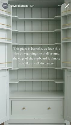 an empty white closet with shelves and drawers on the bottom, in front of it