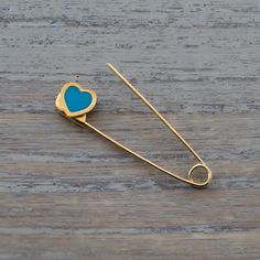 This is a safety pin brooch made of solid gold . The safety pin is 3.1cm(1.25 inches)long and weighs 0.6grams. Here is some details of the item: Gold-Glossy finish-Hand Made-Enamel-375 or 585 or 18K hallmarked Here is some informations about gold carat: Gold carat There are several carats available for gold. The carat is the gold content of the metal. The carat measures the proportion of pure gold mixed with other metal alloy to make up the final metal. The gold carats normally used in jewellery Gold Safety Pin Lapel Pin Gift, Gold Safety Pin Lapel Pin For Gift, Gold Safety Pin Lapel Brooch, Safety Pin Heart, Safety Pin Jewelry, Safety Pin Brooch, Gold Baby, Pin Jewelry, Baby Safety