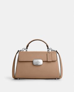 COACH® | Eliza Top Handle Designer Purses, Coach Outlet, Purses Designer, Small Accessories, Handle Bag, Bags And Accessories, You Bag, Look Book, Inside Pocket