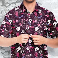 💀Work hard, party harder. Spider Web Short Sleeve Button-Down Shirt features Exclusive, original artwork by NeoSkull. Each item is individually printed, cut, and sewn to ensure a flawless graphic with no imperfections. A great addition to Your alternative clothing wardrobe. Stay cool with this fun printed short-sleeve button-down shirt. It comes in regular width and spread collar. Perfect for those dressier hot days. Always up-to-date skull Decor Goth Clothing. * Fabric: 100% Polyester Poplin * Crowlines Shirt, Cool Button Up Shirts, Colorful Goth, Button Down Style, Clothing Wardrobe, Funky Shirts, Goth Shirt, Goth Clothing, Magic Items