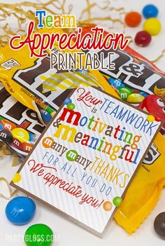 a candy bag with the words team appreciation printable on it next to some candies