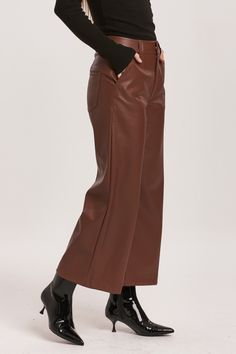 Super high rise cropped wide leg pants. A statement-making wonder resting at the natural waist, offering a relaxed silhouette in the hip and thigh. Cropped inseam on vegan leather accented with back patch pockets, wide hem opening, back darts for lift support, self covered button waistband closure.12 1/2" Front Rise (include waistband), 23" Leg Opening, 25" inseam (Size 27) COMFORT STRETCH: Slightly snug, give sometime to ease in, may go up one size 100% PU (VEGAN LEATHER) Hand wash cold (inside Tencel Denim, Denim Essentials, Cropped Wide Leg Pants, Leather Pant, Dear John, Comfy Sweaters, Faux Leather Pants, Sweater Sale, Light Wash Jeans