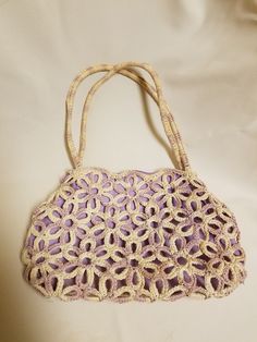 "Beautiful purse for macrame lovers, it has a beautiful flower pattern Unique style Dimensions: 13\" x 9\" PLEASE CONTACT FOR ANY QUESTIONS! FINAL SALE, NO RETURNS, NO EXCHANGES!" Summer Purple Crochet Tote Bag, Purple Crochet Tote Bag For Summer, Casual Handmade Purple Shoulder Bag, Purple Crochet Bag For Everyday Spring Use, Spring Beach Bag In Purple, Purple Beach Bag For Spring, Purple Shoulder Bag With Braided Handles, Spring Macrame Crochet Tote Bag, Handmade Bohemian Purple Crochet Bag