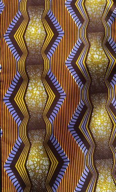 an orange, blue and yellow patterned fabric