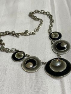 This gorgeous retro minimalist piece is unique looking and feels heavy! Approximately 49-50cm in length, the metal chain has some scuffs and marks but retains it's charm. Feels Heavy, Retro Minimalist, 1960s Jewelry, Handmade Chain, Enamel Necklaces, Lovely Necklace, Necklace Vintage, Silver Enamel, Black And Silver