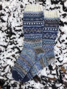 Drops Design These gorgeous traditional Norwegian socks are handknitted and really soft and comfortable on your feet. They are made with 75% wool and 25% polyamide and it is a four stranded yarn. It is superwash treated, which makes it machine washable and easy to care for. These are perfect for all year round. Ships worldwide from Norway Nordic Knitted Winter Socks, Winter Nordic Knitted Socks, Hand Knitted Nordic Style Winter Socks, Nordic Style Hand Knitted Winter Socks, Hand Knitted Yarn Socks For Winter, Winter Knitted Yarn Socks, Handmade Yarn Socks For Winter, Comfortable Blue Knitted Socks, Cozy Knitted Blue Socks