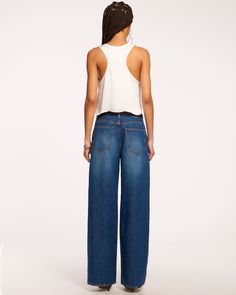 Polished, yet ultra-cool, the Kailani low rise jean features a relaxed silhouette with pleated front detail in a non-stretch denim. Style this loose jean with boots and a sweater for the perfect fall look. This style is sold exclusively at Ramy Brook. Size & Fit – This style runs large, we suggest sizing down. – Rise: 11.5" Inseam: 32" Leg Opening: 21.5", based on size S– Model is Wearing Size 25 – Model is 5'9" Size Guide Details & Care – Sneaker length – Loose, relaxed fit – Side seam pockets Low Rise Jean, Ramy Brook, Loose Jeans, Denim Style, Fall Looks, S Models, Stretch Denim, Low Rise, Size Guide