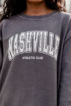 Details Nashville Athletic Club Charcoal Corded Graphic Sweatshirt Fabric has stretch, relaxed fit Long sleeves with a crew neckline and cute fall design Pair this sweatshirt with jeans and sneakers Unlined Size small fromshoulderto hem: 27" Material and Care Cotton blend Chicka-D sweatshirt Patterns may vary Materials may have natural variations Colors may vary from different viewing devices. PLEASE NOTE: You may notice some off-white residue or slight discoloration when you first receive your Fall College Style Loungewear Top, Casual Tops With Ribbed Cuffs For College, Casual Tops With Ribbed Cuffs For Campus, Casual Soft-washed Sweatshirt For College, Varsity Style Spring Loungewear Tops, Collegiate Spring Loungewear Tops, Collegiate Style Tops For Spring Loungewear, Spring Collegiate Loungewear Tops, Collegiate Spring Tops With Ribbed Cuffs