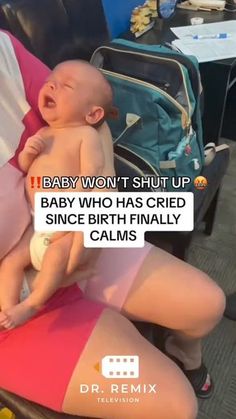 a woman holding a baby in her lap with the caption'baby won't shut up, baby who has cred since birth finally calms