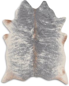 a gray and white cowhide rug on a white background