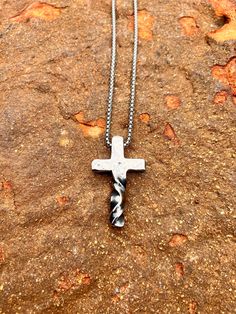 Custom, hand forged Stainless Steel twisted and Hammered Cross Pendant with stainless chain! This material is made of a 100% Stainless steel and will not rust, bend or break.  At FullHeartForge, I take pride in craftsmanship, quality and great service. That said, these pendants, like us humans are imperfect! And like us, they come unique, with blemishes, scars, bends and bulges. They are beautiful, individually and uniquely made works of art, not mass produced, perfect jewelry. If you want that, I would suggest your nearest mall.  The process is entirely done by me, by hand, and involves heating, hammering, and quenching Stainless Steel under the will of heat and force. Each pendant is stamped with my forge mark of a single heart on the back side of the pendant along with the words faith, Hand Forged Stainless Steel Jewelry For Gifts, Hand Forged Stainless Steel Jewelry As Gift, Handmade Stainless Steel Cross Necklace, Oxidized Stainless Steel Cross Jewelry, Oxidized Finish Stainless Steel Cross Jewelry, Handmade Stainless Steel Cross Pendant Jewelry, Handmade Stainless Steel Cross Pendant, Handmade Stainless Steel Cross Jewelry, Steel Cross