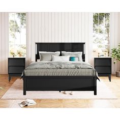 a bedroom with a bed and two nightstands