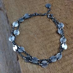 Bracelet- oxidized sterling silver, handmade jewelry, raw silver, Finished Chain Bracelet made of 925 silver. Silver oxidizes and polished. Length of the bracelet is 7.1/7.5/7.9 inches (18/19/20 cm), plus the regulatory chain 0.8 inches (2 cm). Coin have diameter 0.28 inches (0,7 cm) The bracelet is packed in an elegant box. Please write if you need changes. S H I P P I N G : If you need things for special occasions or by a certain date please ensure that you order in plenty of time as the postal system is not always reliable. I'll do my best to meet these shipping estimates, but can't guarantee them.  All objects are carefully wrapped in a bubble wrap and a box or input in elegant jewelry boxes.  The buyer may withdraw the sale/purchase contract, without giving reasons, within 14 calendar Adjustable Silver Chain Bracelet With Oxidized Finish, Adjustable Oxidized Silver Chain Bracelet, Adjustable Oxidized Chain Bracelet, Hand Forged Sterling Silver Bracelets, Adjustable Oxidized Sterling Silver Chain Bracelet, Gift Chain Bracelet With Oxidized Finish, Round Chain Bracelet With Oxidized Finish As Gift, Oxidized Finish Chain Bracelet As Gift, Purchase Contract