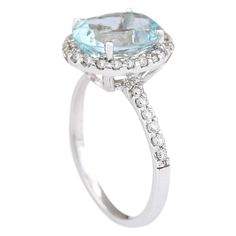 Stamped: 14K White Gold Total Ring Weight: 3.7 Grams Ring Length: N/ARing Width: N/A Gemstone Weight: Total Natural Aquamarine Weight is 3.01 Carat (Measures: 11.00x8.90 mm) Color: Blue Diamond Weight: Total Natural Diamond Weight is 0.60 Carat Quantity: 34 Color: F-G, Clarity: VS2-SI1 Face Measures: 13.60x11.50 mm Sku: [703797W] 14k White Gold Diamond Ring, Gold Diamond Ring, White Gold Diamond Rings, Natural Aquamarine, Blue Diamond, White Gold Diamonds, Precious Metals, Aquamarine, Natural Diamonds