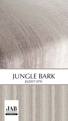 an image of a bed with the name jungle bark on it and a striped background