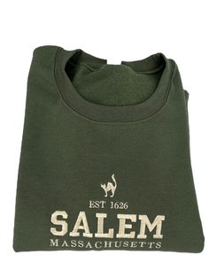 Salem Massachusetts Spooky Season shirt available in unisex sized 100% cotton tee or 50/50 cotton/poly blend crewneck sweatshirt-choose from so many colors! NOTES:  -Standard Processing time is between 1-5 Business Days (We work our butts off to get our orders out sooner than this. During the holidays expect slight delays as we are busier than ever, but know that we are working around the clock to make sure your order gets to you ASAP.   -Our Free Shipping uses USPS First Class mail which takes 1-5 business days to be delivered. -Upgrade to Priority shipping (for an extra fee) and receive your package in 2-3 business days. -IN A HURRY? Purchase our RUSH listing from our store to have your package mailed out same or next business day with expedited shipping.  **IMPORTANT - PLEASE READ! -We Fall Fan Apparel Cotton Sweatshirt, Cotton Crew Neck Sweatshirt With Screen Print, Cotton Soft-washed Crew Neck Sweatshirt, Soft-washed Cotton Crew Sweatshirt, Fan Apparel Sweatshirt With Embroidered Logo, Fan Apparel Crew Neck Sweatshirt With Embroidered Logo, Fan Apparel Sweatshirt With Embroidered Logo And Crew Neck, Screen Print Cotton Sweats With Long Sleeves, Cotton Long Sleeve Sweats With Screen Print