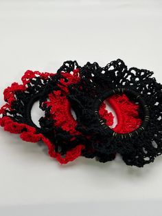 🎀Our 3 pieces of red and black hair ties are gentle. They don't slide or come off, and you'll see that your ponytail remains in place the whole day minus the creasing a traditional scrunchie would provide. Dividend and softer material, fine texture, glossy and relaxing, stretchable and elastic. A more attractive look for all the girls and a creek of happiness for everyone. The best part is these hair ties won't damage your hair. Suitable for thick hair. 🎀These crochet ponytail holders are excellent hair supplements for buns, messy buns, ponytails, plaits, or pigtails. Each hair tie includes long-lasting elastic bands, smooth and comfortable to wear and fix your hair firmly. It is effortless to extract it without harming your hair. Long-lasting enough to be utilized for a long time. These Black Hair Ties, Scrunchies Crochet, Crochet Ponytail, Hair Supplements, Messy Buns, Hair Scrunchies, Ponytail Holder, Plaits, Hair Long