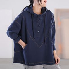 Casual Hooded Jacket With Patchwork And Long Sleeves, Casual Hooded Jacket With Patchwork, Casual Long Sleeve Hooded Jacket With Patchwork, Navy Long Sleeve Hoodie With Pockets, Casual Patchwork Hoodie Sweater, Casual Oversized Patchwork Hoodie, Oversized Patchwork Hoodie With Long Sleeves, Oversized Casual Hoodie With Patchwork, Casual Long Sleeve Patchwork Hoodie