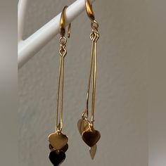 Rustic Brass Heart Charms Delicately Trickle From Varying Lengths Of Rounded Brass Snake Chain, Resulting In A Flirtatious Tassel. Earring Attaches To A Standard Fishhook Fitting. Artsy Earrings, Crystal Heart Earrings, Dior Earrings, Tassel Earring, Silver Statement Earrings, Kate Spade Earrings, Heart Dangle Earrings, Bee Earrings, Beaded Drop Earrings