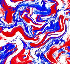 red, white and blue swirls in water